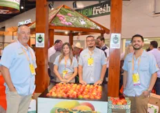 The Freska team taking time from several meetings to show their mangos on display in their branded boxes.
